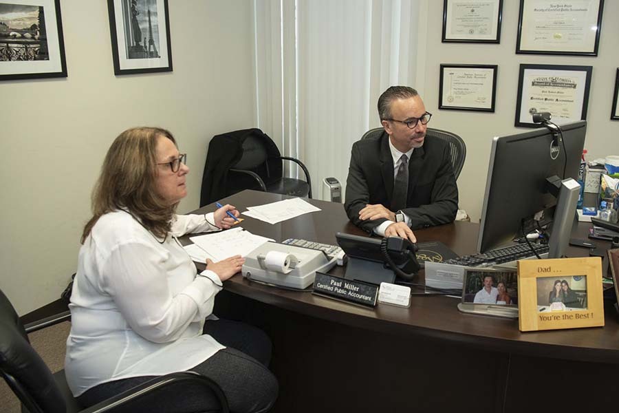 NYC CPA meeting with a first time client and providing tax and accounting consultation at Miller & Company LLP
