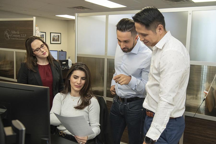 Net investment income tax planning consultation with CPA in NYC helping client with investment tax strategy and compliance