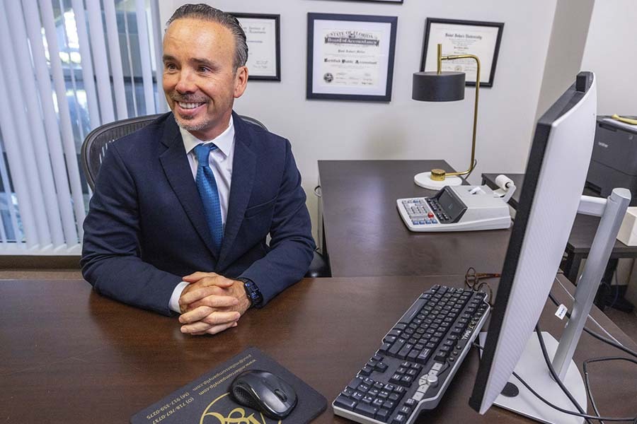 Manhattan NYC CPA advising business owner on payroll tax problems and IRS tax resolution at Miller & Company LLP