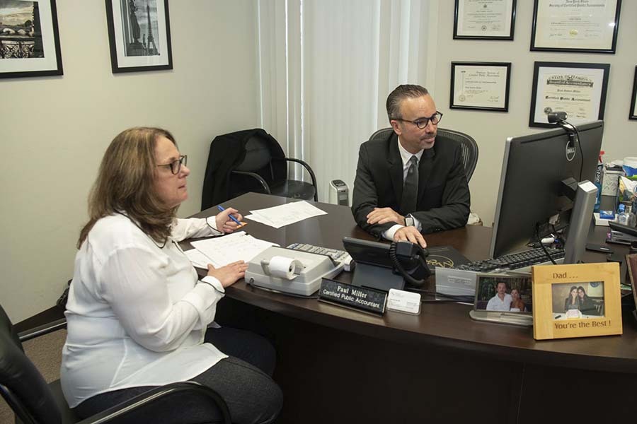 Manhattan CPA helping small businesses with bookkeeping services financial organization and reporting