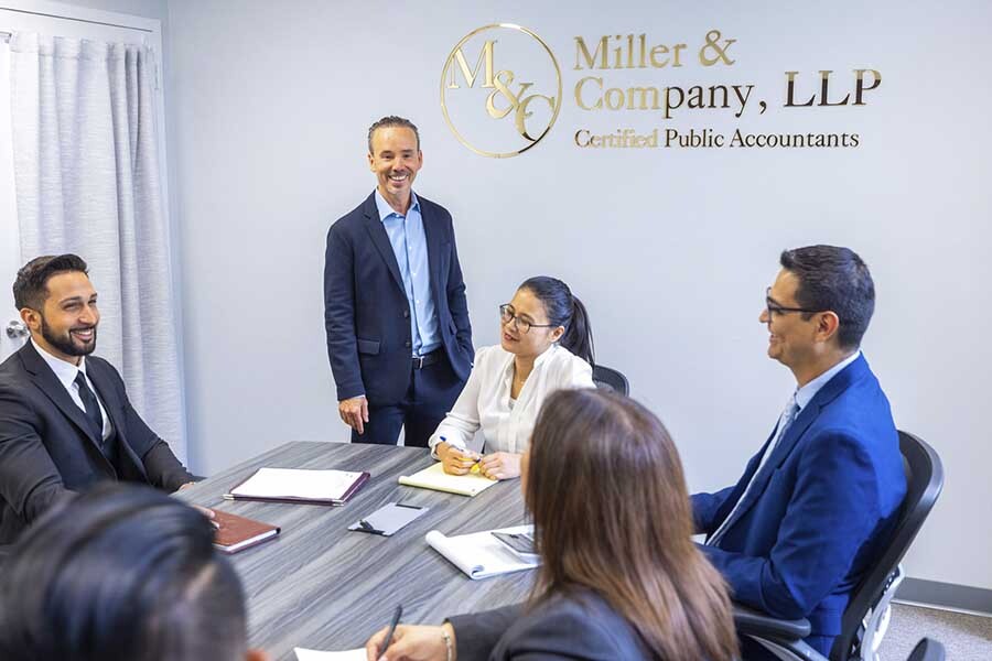 NYC CPA providing strategic financial planning and business advisory consultation at Miller & Company LLP office