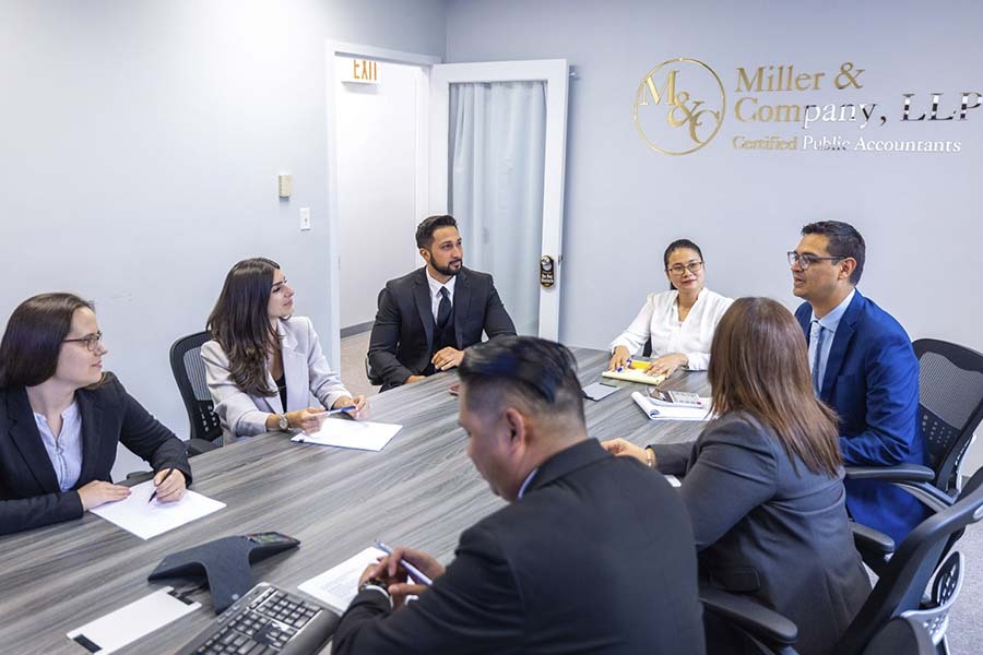 NYC CPA advising business owner on succession planning and long-term business transition strategy in Manhattan office