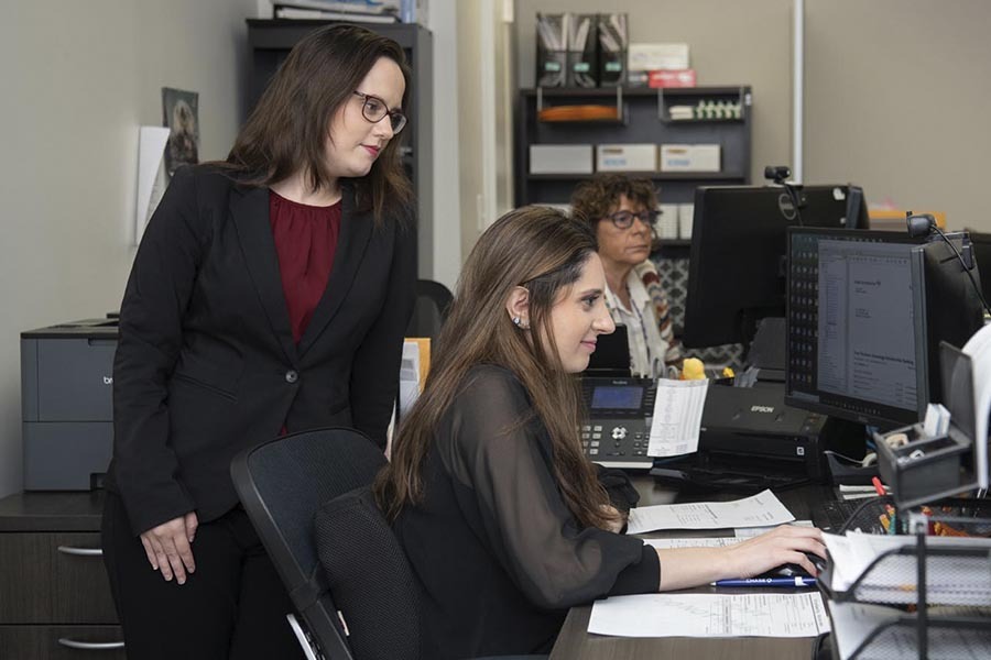 Manhattan CPA team handling IRS tax resolution services including audits liens and payroll tax problems