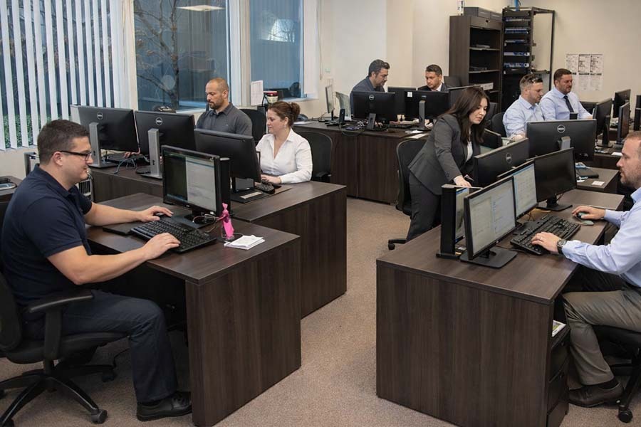 NYC CPA team analyzing financial data and developing tax planning strategies for clients at Miller & Company LLP