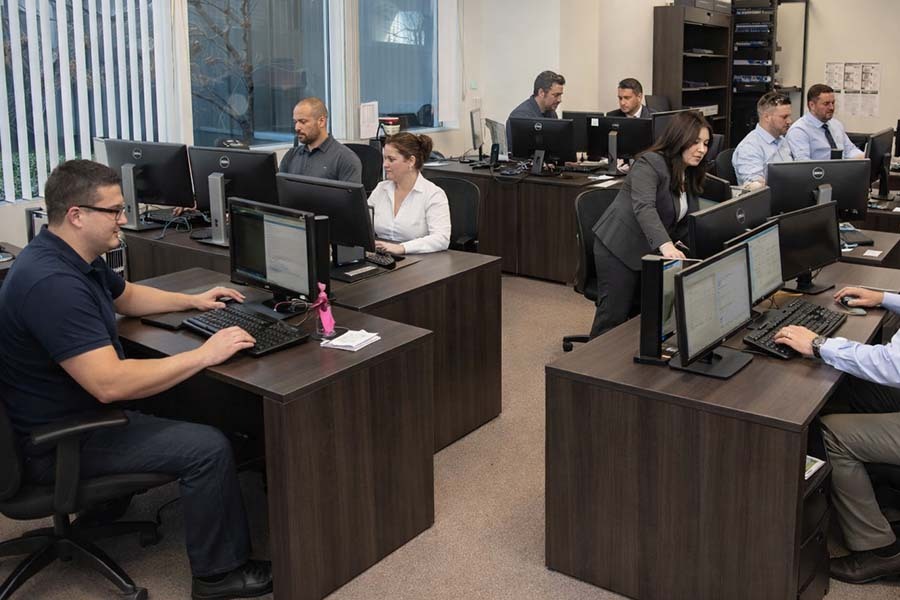 NYC CPA team assisting clients with back taxes owed and IRS tax resolution at Miller & Company LLP office