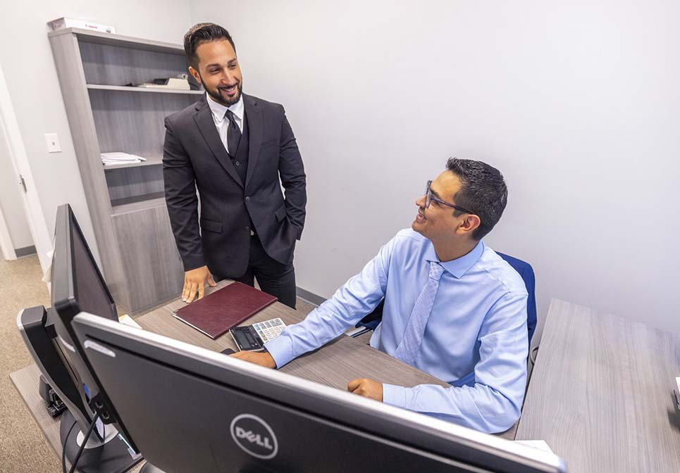 CPA reviewing FBAR and FATCA foreign account reporting requirements with a client in New York City