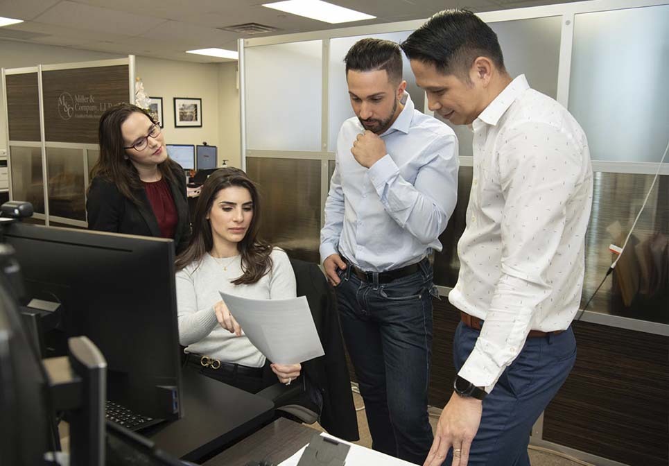 Miller & Company CPA team reviewing documents for New York residency and domicile planning